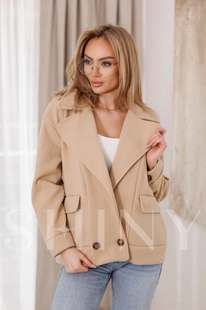 Beżowa kurtka z opuszczonymi ramionami