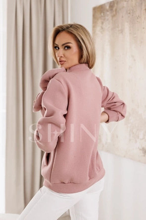 Różowa dzianinowa narzutka z ozdobnym motywem