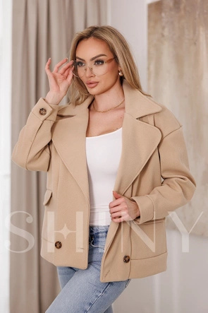 Beżowa kurtka z opuszczonymi ramionami