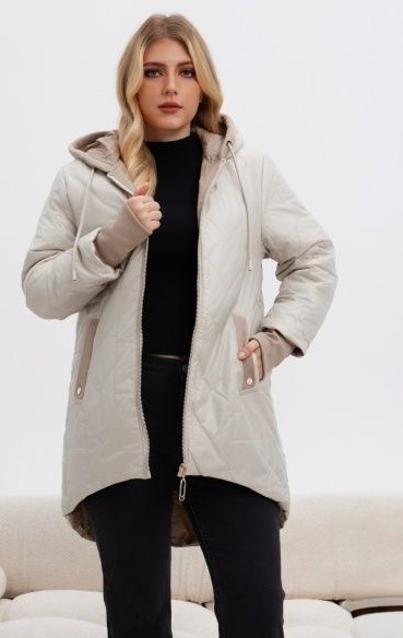 Jasnobeżowa pikowana kurtka damska z asymetrycznym dołem